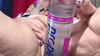 Big Bottle Plugged Clit Cunt