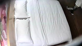 Cute amateur asian web cam girl playing with her toy