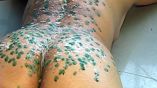 Mature MILF Enjoys Hot Wax Dripping Across Her Ass