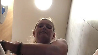 Power Pissing From a Perfect Hairy Pussy in Public Toilets