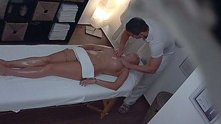 Busty beauty gets an erotic massage