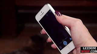 Lezdom MILF whips redhead sub before fucks her with strapon