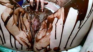 Pussy soaking and cumming with chocolate over clit