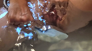 Mature Wife Masturbates in the Bathtub and Then Lets Her Husband Fuck Her From Behind Until He Cums Inside Her