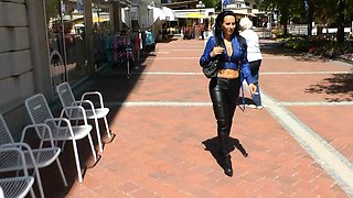 Bare brunette babe swallows cum in public