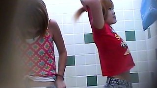 Cute amateur Asian web cam girl teases her great body