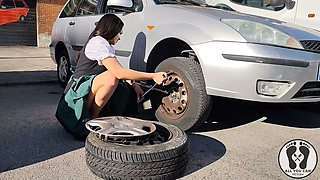 Dirndl Slut Gets Dirty and Oily Changing Tires