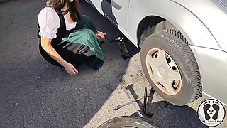 Dirndl Slut Gets Dirty and Oily Changing Tires