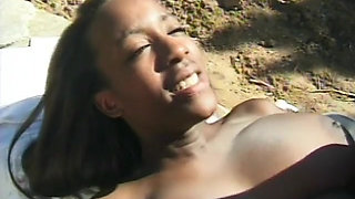 Black beauty gets her shaved cunt banged hardcore outdoors