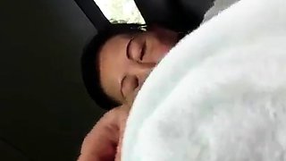 Asian MILF Gives a Handjob in a Car
