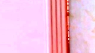 Busty piss fetish babe plays with toys on urine soaked table