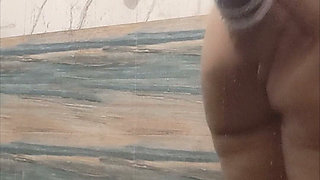 Desi bhabhi house wife taking shower rubbing boobs and pussy