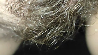 Hairy pussy from behind fingering