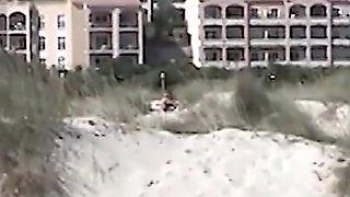 Pervert chaser on beach