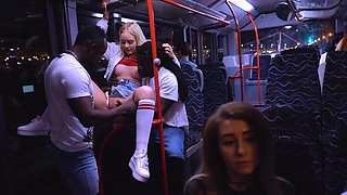 Antonio Black pounds Emily Cutie's tight ass in a steamy threesome on the city bus
