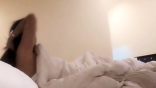 Cute amateur asian web cam girl playing with her toy