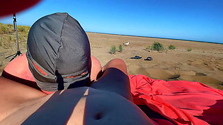 My cuckold licks on the beach