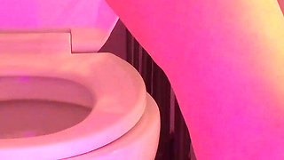 Emily pissing in the bathroom