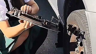 Dirndl Slut Gets Dirty and Oily Changing Tires
