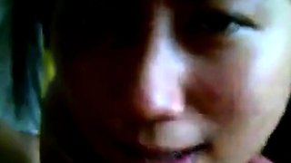 Asian College Girl Gives a Blowjob and Swallows