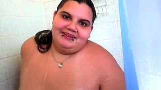 Fat amateur brunette puts herself on display in the shower