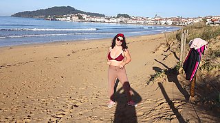 Woman Pissing on a Public Beach While No One Is There