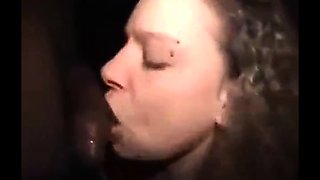 Interracial gloryhole blowjob from a brunette