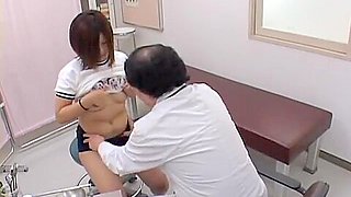 Japanese girl is examined by the gynecologist in spy video