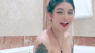 Busty babe playing with her big boobs