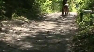 Humiliating whipping kneeling on the lake shore