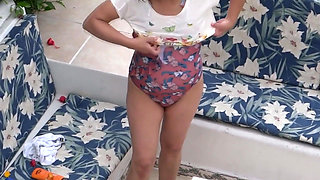 Beautiful stepmother on the beach shaves her hairy pussy to put on a bikini.