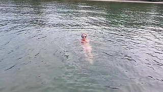 Sexy Granny Swims Naked in a Lake!