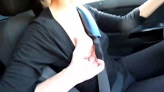 Attractive brunette delivers a fabulous handjob in the car