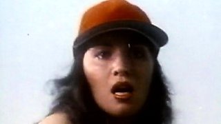 Lesbians licking and fingering on couch